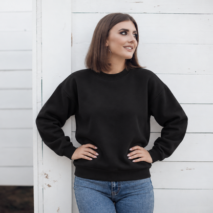 Black crewneck color mockup shown on a model; embroidery added through personalization