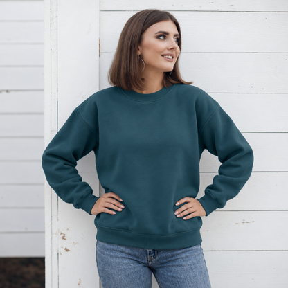 Deep Cyan crewneck color mockup shown on a model; embroidery added through personalization