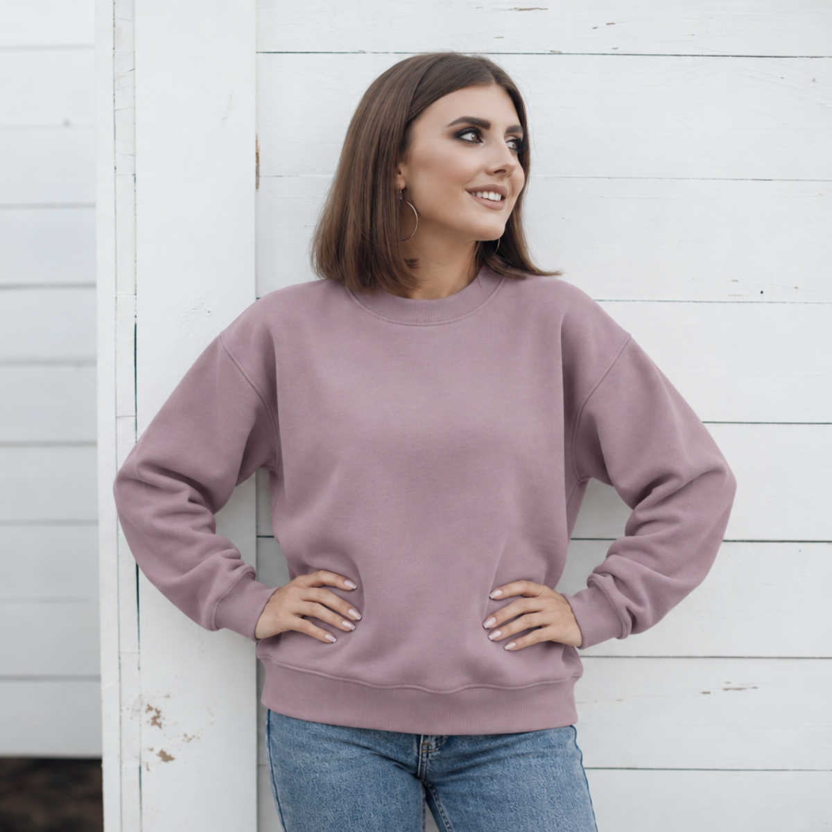 Smoky Amethyst crewneck color mockup shown on a model; embroidery added through personalization